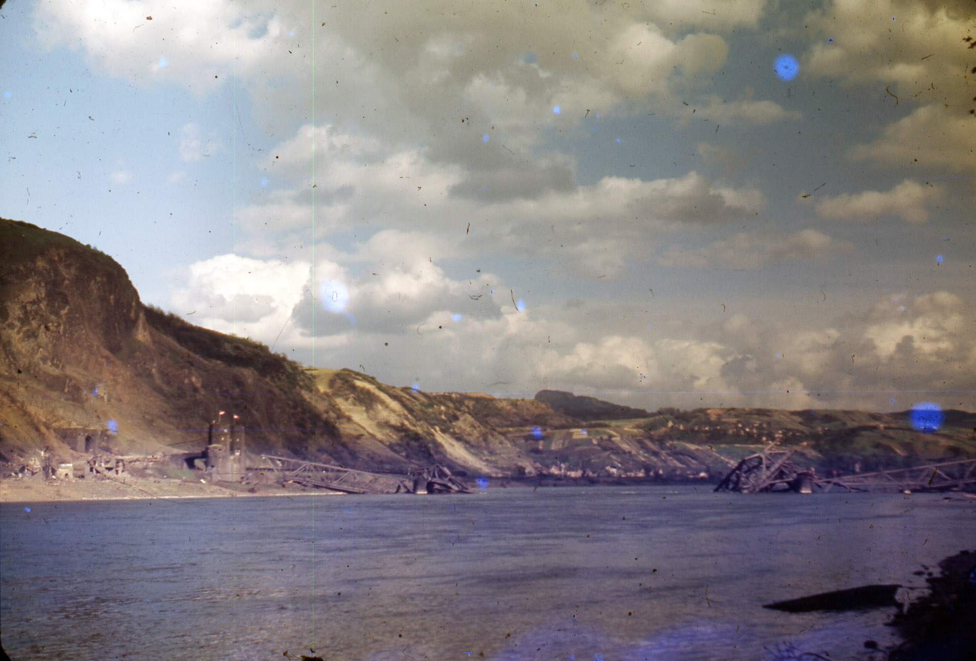 color view of river and destroyed bridge